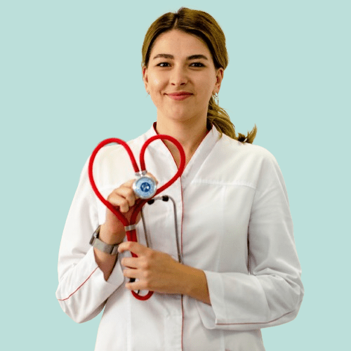 A doctor holding a heart-shaped stethoscope