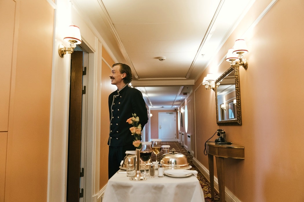 Room service employee serving rooms